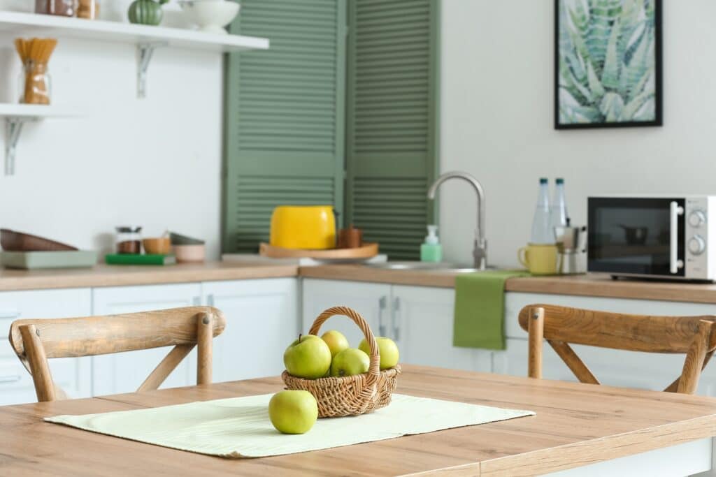 A beautifully luminous kitchen, showcasing the results of work done by expert kitchen painters.