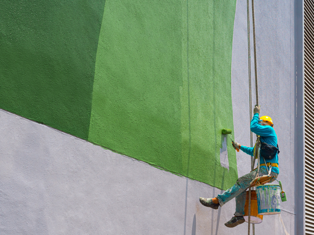 An individual engaged in commercial painting.