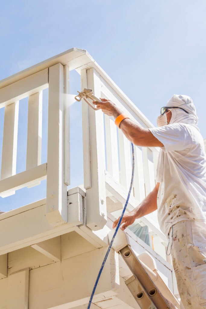 A painter from one of the residential painting contractors near me using VOC-free paints. 