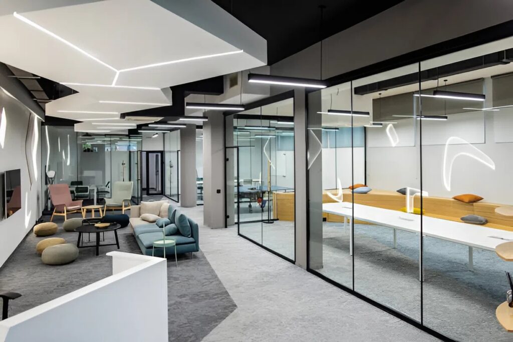 Office interior with smooth neutral gray and white walls, clean matte finishes by a commercial painter in Wichita, KS.