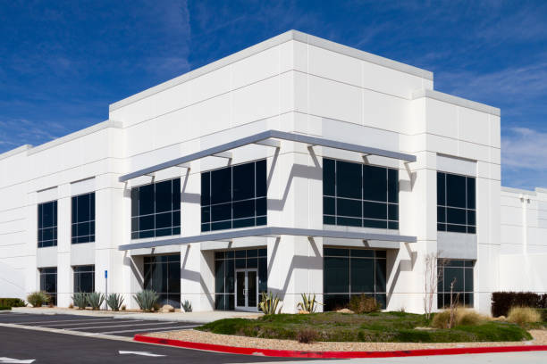 Modern white commercial office exterior with clean lines by an exterior painter in Goddard, KS