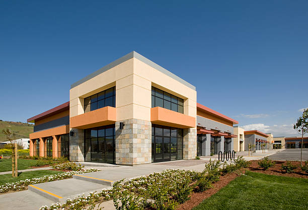 Modern office building exterior with neutral tones and clean lines by an exterior painter in Goddard, KS