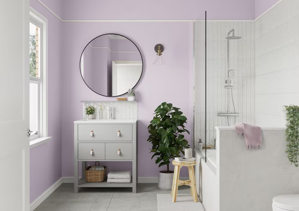 Soft lavender walls with crisp trims and clean finishes by an interior painter in Andover, KS.