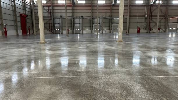 Warehouse concrete floor with protective epoxy coating by a painting company in Valley Center, KS.