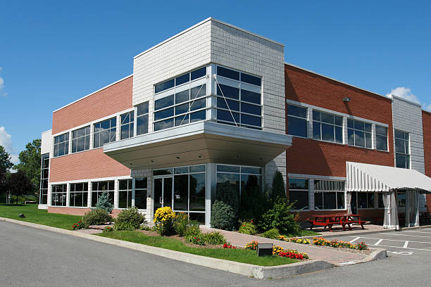 Commercial building with neutral paint colors and durable exterior finishes by an exterior painter in Valley Center, KS.